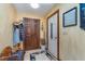 Welcoming entryway with tile flooring, coat rack, decorative items, and natural light at 7020 N 375 E, Lebanon, IN 46052