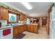 Spacious kitchen with oak cabinets, a large window, and a tile floor at 7020 N 375 E, Lebanon, IN 46052