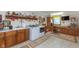Well-organized laundry room with modern washer, dryer, sink, storage, and workspace at 7020 N 375 E, Lebanon, IN 46052