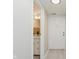 Stylish powder room features a vessel sink, marble countertop, and updated lighting fixtures at 7404 Countrybrook Dr, Indianapolis, IN 46260