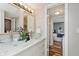 Bathroom boasts double vessel sinks with marble countertop at 7404 Countrybrook Dr, Indianapolis, IN 46260