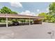 Spacious carport area offering covered parking at 7404 Countrybrook Dr, Indianapolis, IN 46260