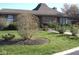 Charming home with well-maintained lawn and landscaping at 7404 Countrybrook Dr, Indianapolis, IN 46260