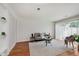 Bright living room with neutral decor and sliding glass doors at 7404 Countrybrook Dr, Indianapolis, IN 46260