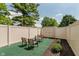 Inviting outdoor patio area, fenced in for privacy, with comfortable seating arrangement at 7404 Countrybrook Dr, Indianapolis, IN 46260