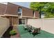 Cozy patio space with outdoor seating, perfect for relaxing or entertaining at 7404 Countrybrook Dr, Indianapolis, IN 46260