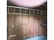 Garage interior with metal racking on the wall at 8728 Holliday Dr, Indianapolis, IN 46260