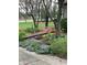 Landscaped garden bed featuring colorful tulips and vibrant spring flowers at 8728 Holliday Dr, Indianapolis, IN 46260