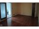 Living room with wood floors, sliding glass doors, and a bright, airy feel at 8728 Holliday Dr, Indianapolis, IN 46260