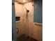 Modern shower with glass door, tiled walls, and rainfall shower head at 8728 Holliday Dr, Indianapolis, IN 46260