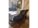 Elegant dining room with a formal table setting and decorative window treatments at , Indianapolis, IN 46226