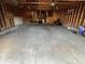 Spacious garage with exposed wood framework and ample room for storage and parking at , Indianapolis, IN 46226