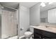 Bathroom featuring a walk in shower, a vanity, and a toilet at 9422 Oakley Dr, Indianapolis, IN 46260