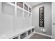 Mudroom featuring storage and a welcome sign at 9422 Oakley Dr, Indianapolis, IN 46260