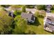This aerial shot showcases the property's location and the well-maintained lawn and outdoor features at 950 Hearthside Dr, Brownsburg, IN 46112