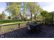 Relax on the back deck overlooking the spacious backyard and green space, perfect for outdoor entertaining at 950 Hearthside Dr, Brownsburg, IN 46112