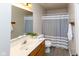 Bathroom featuring a single sink vanity, a tub-shower, and neutral paint at 950 Hearthside Dr, Brownsburg, IN 46112