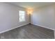 Well-lit bedroom with a big window and neutral wall paint at 950 Hearthside Dr, Brownsburg, IN 46112