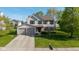 Charming two-story home with a two-car garage, manicured lawn, and inviting curb appeal at 950 Hearthside Dr, Brownsburg, IN 46112