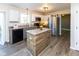 Stylish kitchen with stainless steel appliances, a breakfast bar, and updated cabinets at 950 Hearthside Dr, Brownsburg, IN 46112