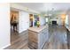 Kitchen featuring a rustic island, stainless appliances and an open concept layout at 950 Hearthside Dr, Brownsburg, IN 46112