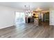 Open kitchen featuring white cabinets, stainless steel appliances, and a center island at 950 Hearthside Dr, Brownsburg, IN 46112