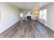 Open living room featuring hardwood floors and a fireplace, creating a cozy atmosphere at 950 Hearthside Dr, Brownsburg, IN 46112