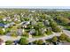 Aerial view of a suburban neighborhood with well-maintained homes, mature trees, and convenient street access at 950 Hearthside Dr, Brownsburg, IN 46112