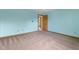 Spacious bedroom featuring carpeted floors and a calming blue color scheme at 960 Arrowwood Dr, Carmel, IN 46033