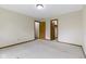 Bedroom featuring open doorways and carpeted floors at 960 Arrowwood Dr, Carmel, IN 46033