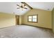 Bedroom featuring vaulted ceiling, fan, and a large window at 960 Arrowwood Dr, Carmel, IN 46033