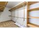 Walk-in closet with built-in shelves and rods offers ample storage at 960 Arrowwood Dr, Carmel, IN 46033