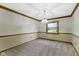 Carpeted dining room featuring a traditional light fixture and natural light at 960 Arrowwood Dr, Carmel, IN 46033