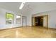 Bright living room featuring hardwood floors and a skylight at 960 Arrowwood Dr, Carmel, IN 46033