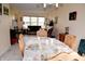 Comfortable dining area features a table set for a meal, bright natural light, and neutral walls at 10691 Morristown Ct, Carmel, IN 46032