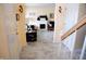 Elegant foyer with marble floors leading to a cozy living room with fireplace at 10691 Morristown Ct, Carmel, IN 46032