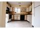 Bright kitchen with ample counter space, white cabinets, and functional appliances at 10691 Morristown Ct, Carmel, IN 46032