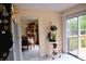 Open kitchen leading to dining area and a sliding door to the deck at 10691 Morristown Ct, Carmel, IN 46032