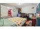 Bright bedroom with sunflower-themed bedding and baby furniture throughout the room at 1121 Eugene St, Indianapolis, IN 46208