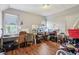 Bright office space with multiple desks, chairs, and plenty of natural light at 1121 Eugene St, Indianapolis, IN 46208