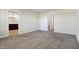 Neutral bedroom showcases plush carpet and leads to bathroom with cabinets at 113 Hunter'S Rdg Dr, Danville, IN 46122