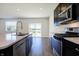Bright kitchen featuring stainless steel appliances, a large island, and an open layout at 113 Hunter'S Rdg Dr, Danville, IN 46122