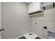 Laundry room with vinyl flooring and shelving at 113 Hunter'S Rdg Dr, Danville, IN 46122