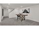 Basement featuring a table with chairs, and white plank walls, perfect for entertaining guests at 11612 Aubrey Ln, Fishers, IN 46040