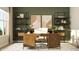 Bright home office with wood desk, shelving, and a comfortable neutral chair at 11641 Aubrey Ln, Fishers, IN 46040