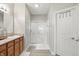 Bright bathroom featuring a glass-enclosed shower and neutral finishes at 11716 Whisper Cove Dr, Fishers, IN 46037