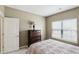 Inviting bedroom featuring a comfortable bed and dresser at 11716 Whisper Cove Dr, Fishers, IN 46037
