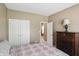 Bedroom with double closets and a dresser at 11716 Whisper Cove Dr, Fishers, IN 46037