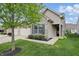 Charming single-Gathering home with a brick facade, attached garage, and a well-manicured lawn at 11716 Whisper Cove Dr, Fishers, IN 46037