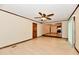 Spacious living room with hardwood floors and an open view into the kitchen at 12087 N Gasburg Rd, Mooresville, IN 46158